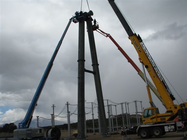Two cranes erecting steel structures during the greenfield build at Youngs Canyon, Arizona